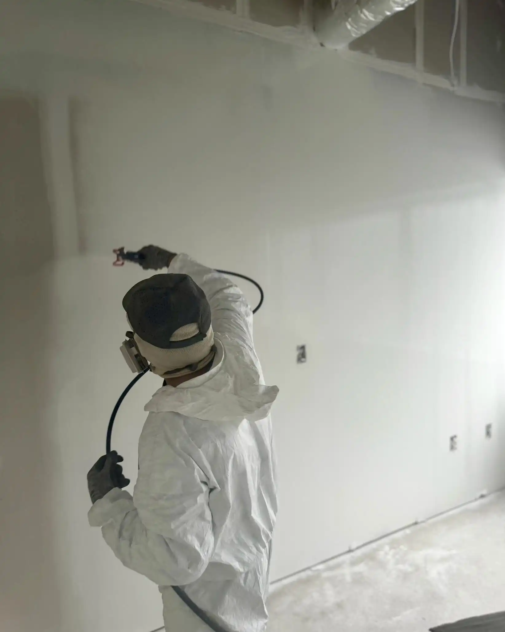 Drywall spray painting for commercial office space